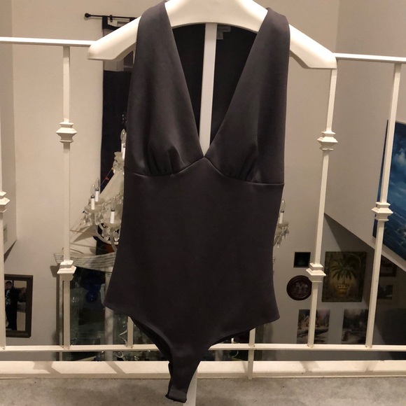 Charlotte Russe Tops - Deep V-neck Bodysuit